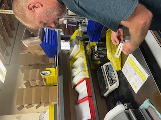 Dean Nelson checking length of security screw